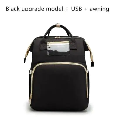 Diaper bag with pull out bed