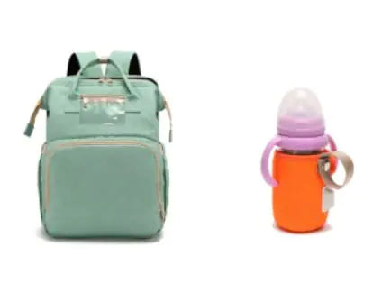 Diaper bag with pull out bed