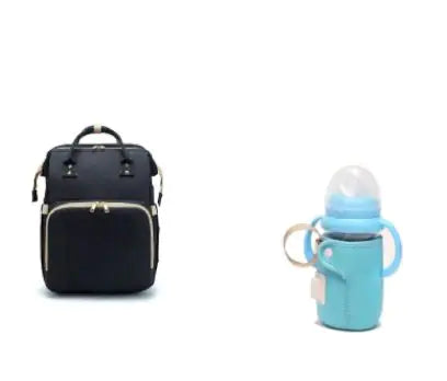 Diaper bag with pull out bed