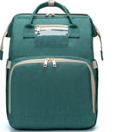 Diaper bag with pull out bed