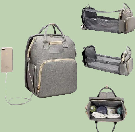 Diaper bag with pull out bed