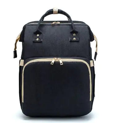 Diaper bag with pull out bed