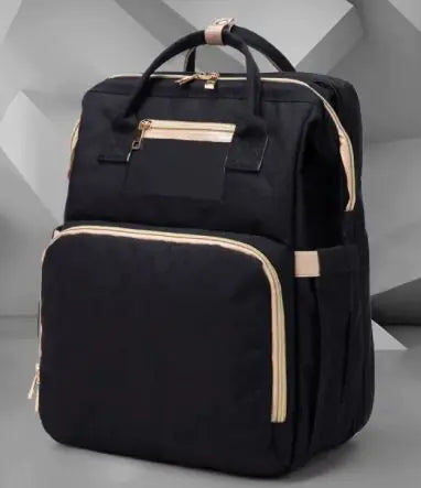 Diaper bag with pull out bed