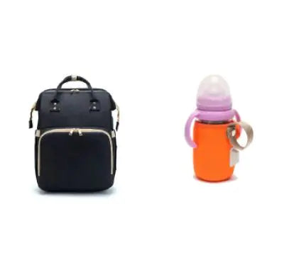 Diaper bag with pull out bed