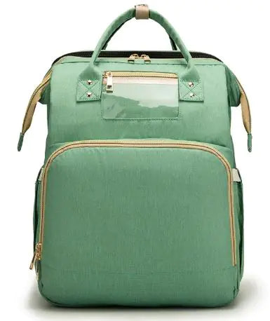 Diaper bag with pull out bed