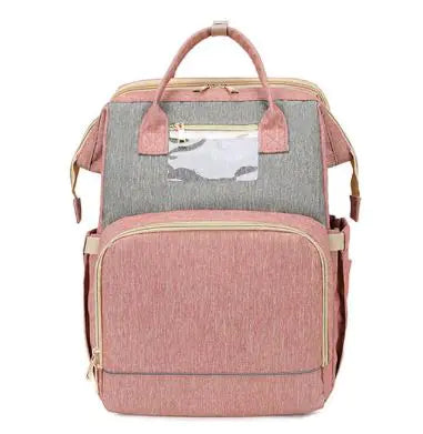 Diaper bag with pull out bed
