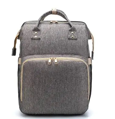 Diaper bag with pull out bed