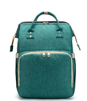 Diaper bag with pull out bed