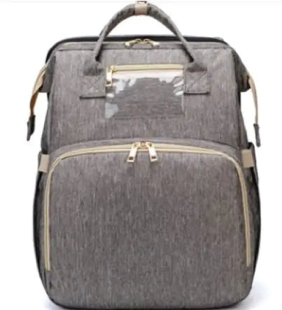 Diaper bag with pull out bed
