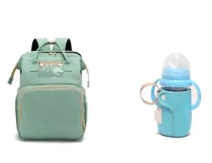 Diaper bag with pull out bed
