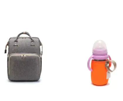 Diaper bag with pull out bed