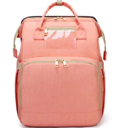 Diaper bag with pull out bed