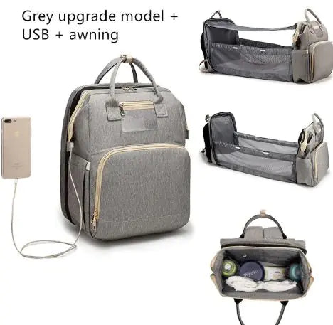 Diaper bag with pull out bed