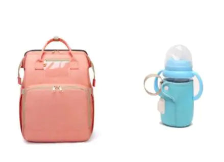 Diaper bag with pull out bed