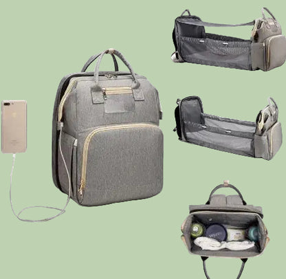 Diaper bag with pull out bed