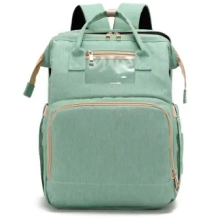Diaper bag with pull out bed